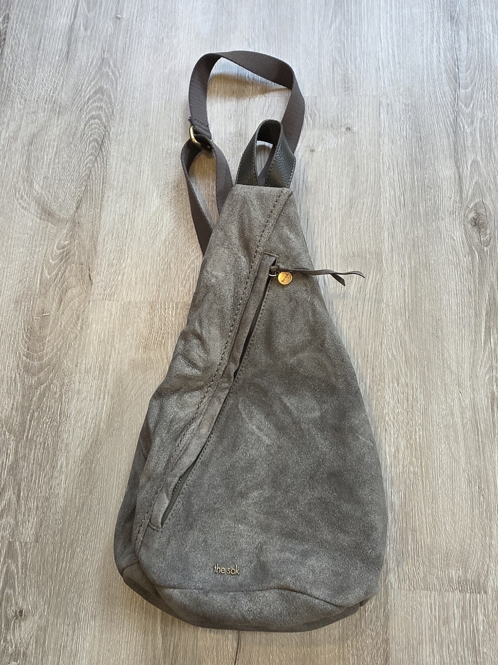 The Sak On The Go Sling Leather Backpack Crossbody Light Green Pockets